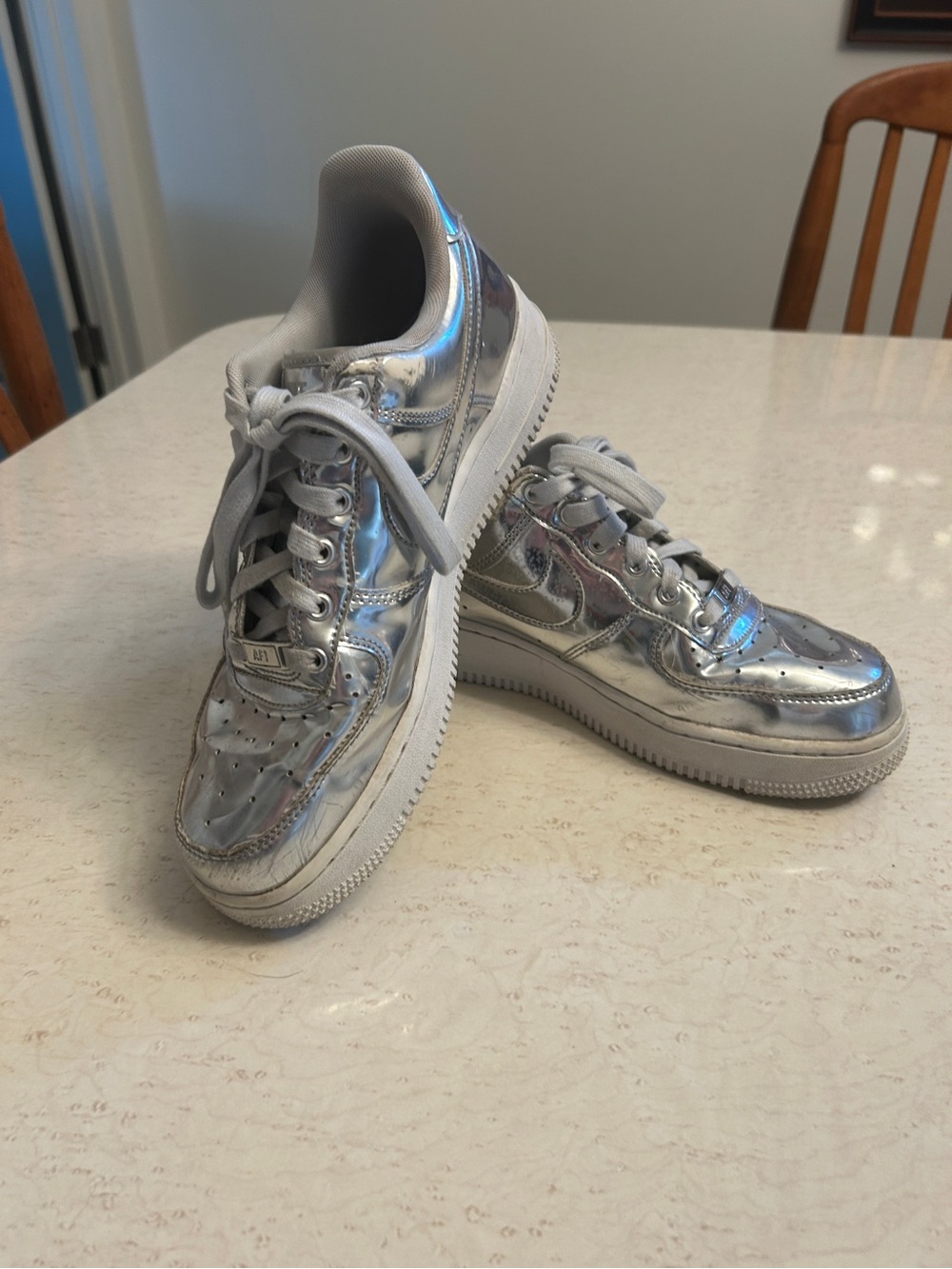 Women’s Nike  Metallic Silver Air Force ones